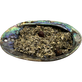 Love Herb Mix Bag - Dried mixed herbs called Love Herb Mix placed on a colorful shell bowl