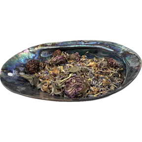 Luck Herb Mix Bag - Dried mixed herbs called Luck Herb Mix placed on a colorful shell bowl