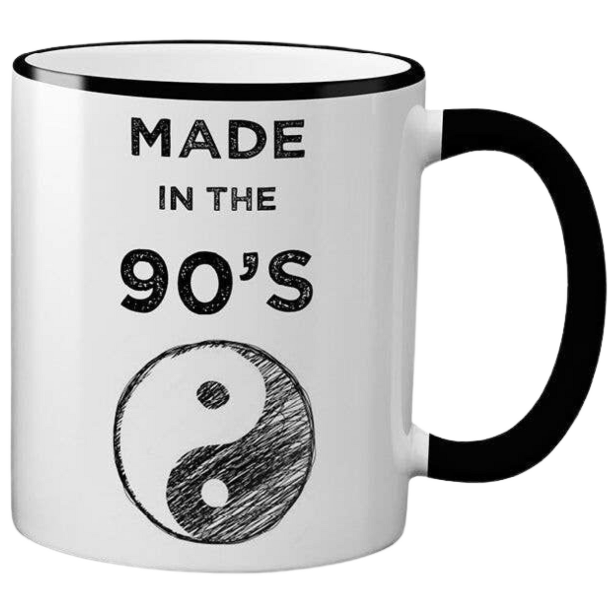 White ceramic mug with black text that reads "MADE IN THE 90'S" and a yin-yang symbol. The mug has a black rim and handle.