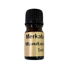 Mandarin Essential Oil - Mandarin Essential Oil in a small amber colored bottle with light brown label and black screw cap.