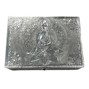 Silver metal box with an embossed Buddha figure and lotus flower design.