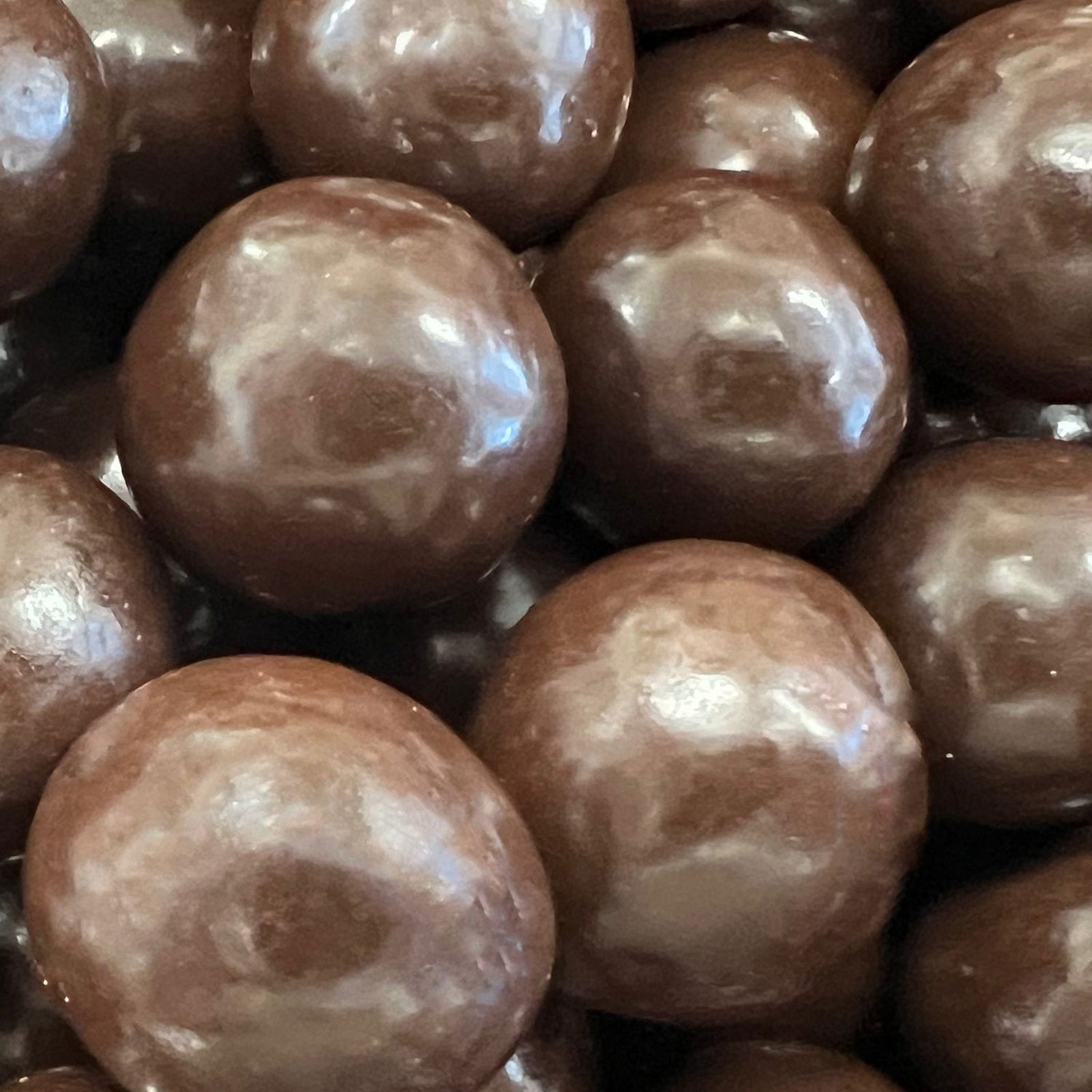 Milk Chocolate Malted Milk Balls - Round marble size chocolate in dark chocolate 
