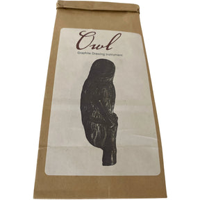 Owl Graphite Drawing Instrument in brown paper bag.