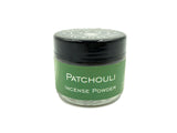Patchouli Incense Powder - Small round, glass container holding patchouli incense powder 