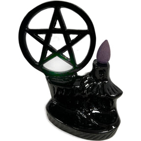 Black ceramic backflow incense burner with pentagram design.