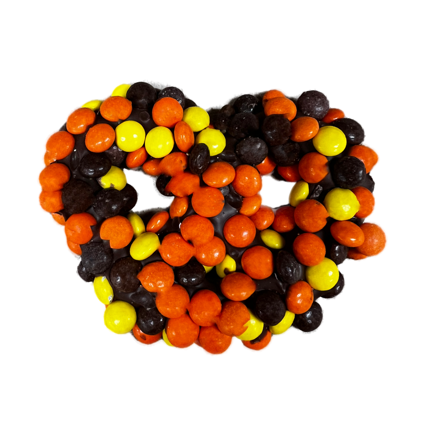 Reese's Pieces Pretzel Milk Chocolate - Palm size pretzel covered in orange yellow a nd black reeces pieces 
