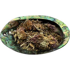 Root Chakra Herb Mix Bag - Dried mixed herbs called Root Chakra Herb Mix placed on a colorful shell bowl