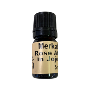 Rose Absolute in Jojoba Oil - Rose Absolute in Jojoba Oil - small amber colored bottle with light brown label and black screw cap.