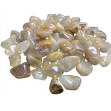 Rutiled Quartz Tumbled - clear tumb led stones with yellow Neeld like growth in side 