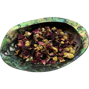 Sacral Chakra Herb Mix Bag - Colorful Dried mixed herbs called Sacral Chakra Herb Mix placed on a colorful shell bowl