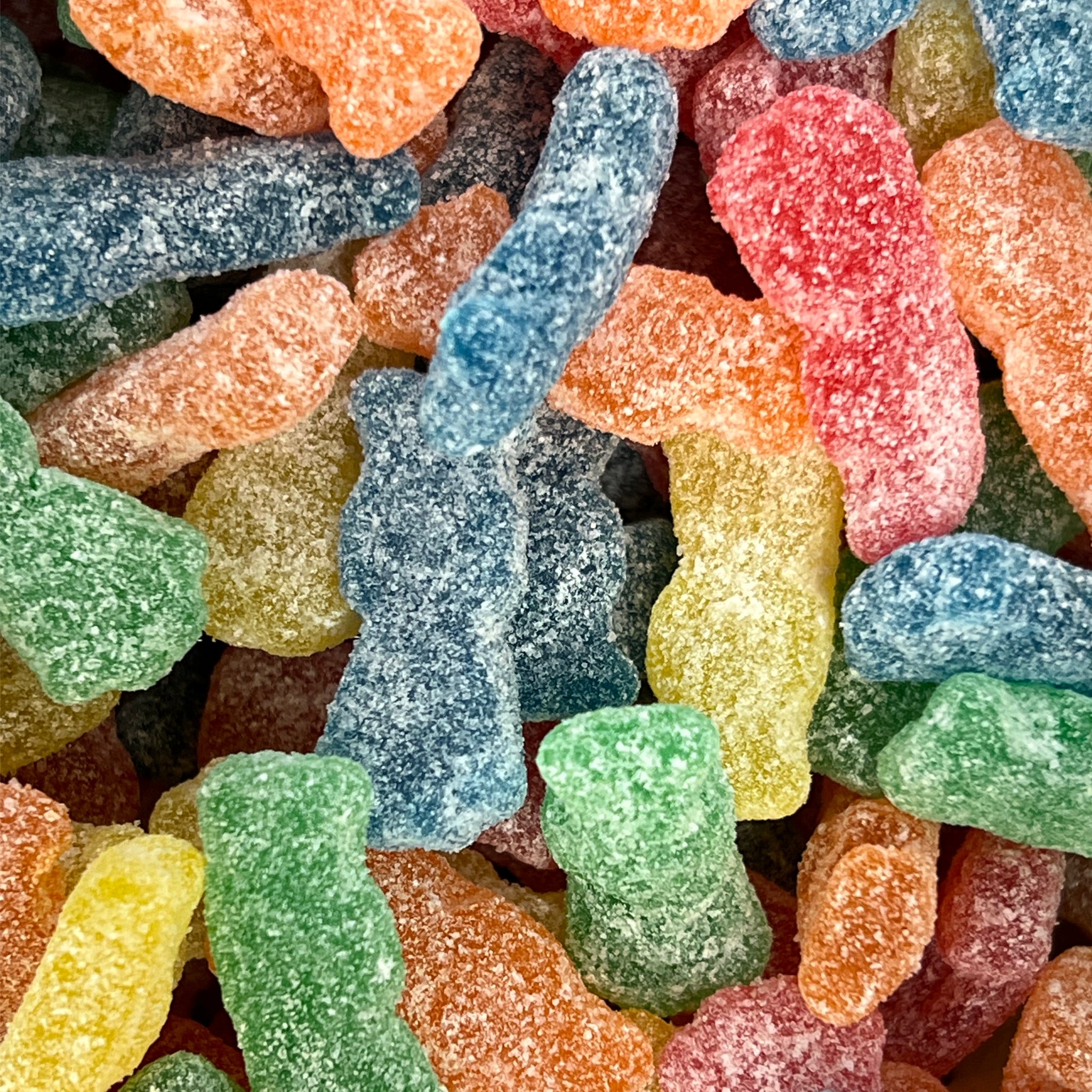 Sugar coated multi colored kid shaped gummies 