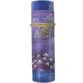 Purple candle with "SPIRITUALITY" label and amethyst pendant.