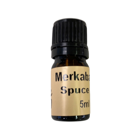 Spruce Essential Oil - Spruce Essential Oil in a small amber colored bottle with light brown label and black screw cap.