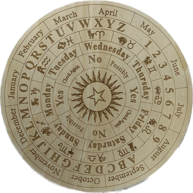 Wooden scrying board with sun, star, and alphabet.