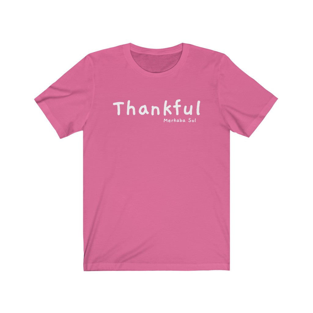 Thankful Short Sleeve Tee - Embrace being thankful. Bring inspiration and empowerment to your wardrobe with this Thankful t-shirt in charity pink color or give it as a fun gift. From merkabasolshop.com