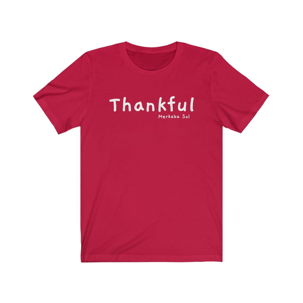 Thankful Short Sleeve Tee - Embrace being thankful. Bring inspiration and empowerment to your wardrobe with this Thankful t-shirt in red color or give it as a fun gift. From merkabasolshop.com