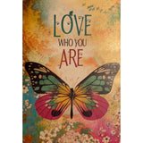 Colorful butterfly on a floral background with the text "Love who you are."