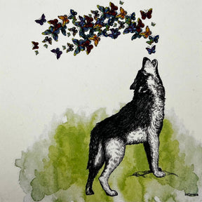 Wolf Butterfly magnet with a wolf howling and butterflies flying around it.