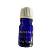 Ylang Ylang Essential Oil - Ylang Ylang Essential Oil in a small blue colored bottle with transparent label and black screw cap.