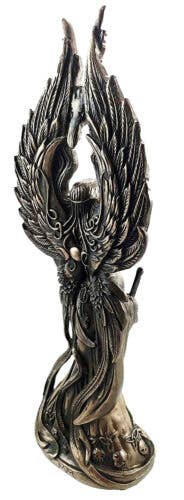 Decorative object with wing-like structures on a white background
