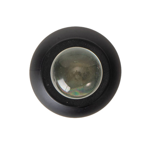 A round black plastic magnifying lens with a clear glass lens in the center, shown against a plain white background.