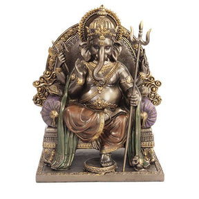 Statue of a deity with intricate details on a white background