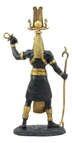 Statue of an Egyptian deity with a white background