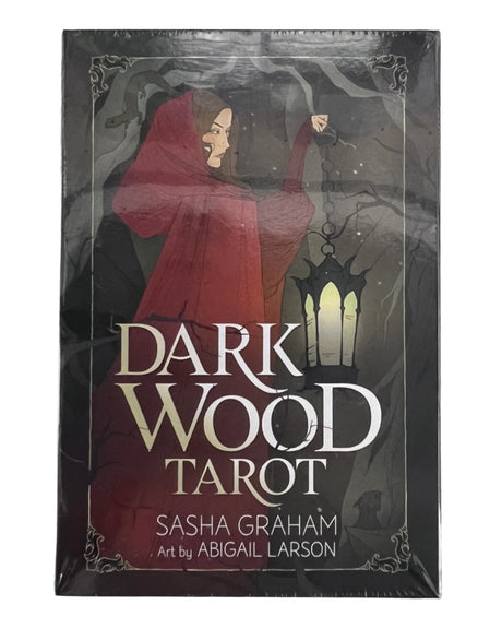 dark wood tarot with black box with image of woman in red cloak 