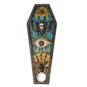 Decorative coffin-shaped doorbell cover with gothic elements on a white background