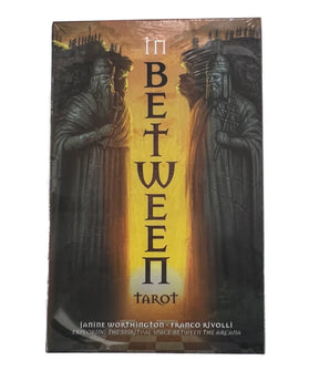in between tarot with large box and statue images 
