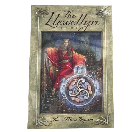 Llewellyn tarot with grey green cover and image of woman sitting 
