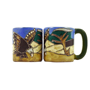 mara mug eagle , blue mug wit tan accents and image of eagle 