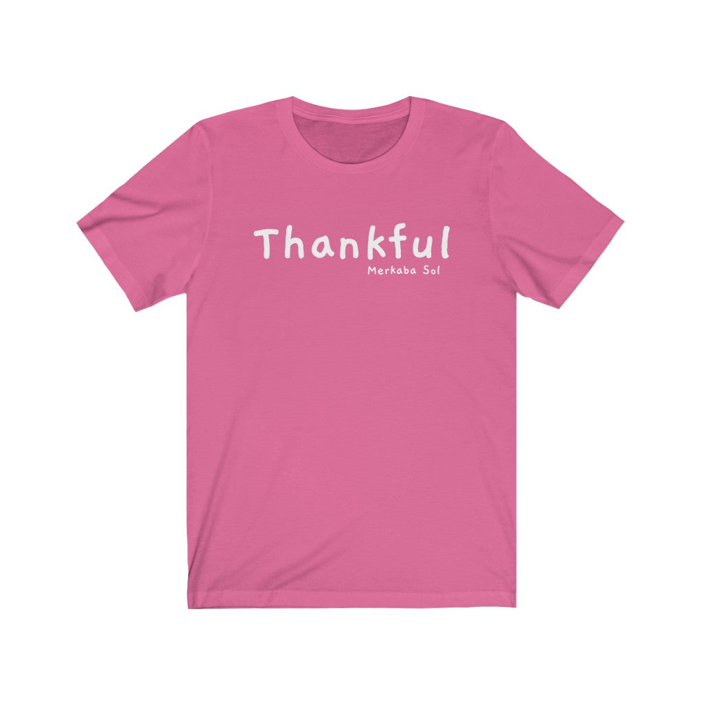 Embrace being thankful. Bring inspiration and empowerment to your wardrobe with this Thankful t-shirt in charity pink color or give it as a fun gift. From merkabasolshop.com