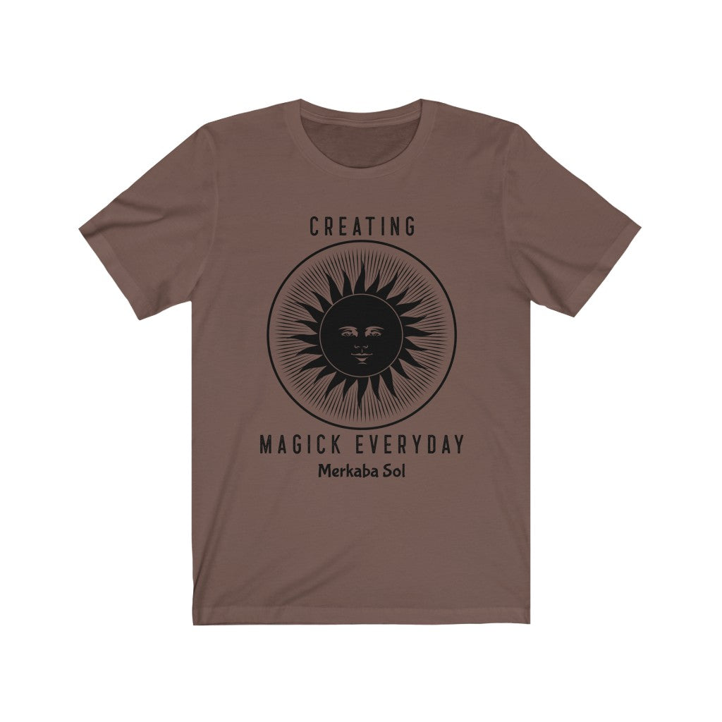 Creating Magick Everyday. Bring inspiration and empowerment to your wardrobe with this Creating Magick Everyday t-shirt in brown color or give it as a fun gift. From merkabasolshop.com
