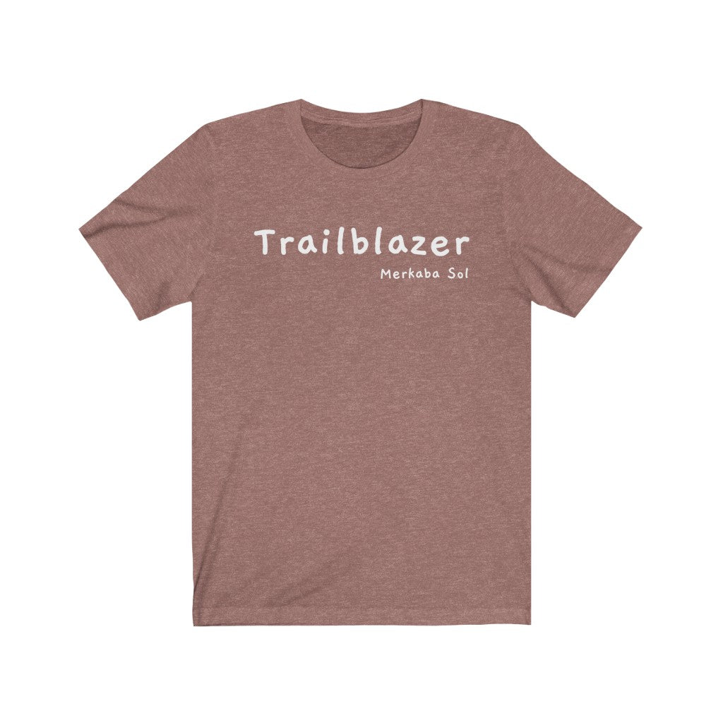 Let your inner trailblazer shine. Bring a unique shirt to your wardrobe with this Trailblazer t-shirt in heather mauve color or give it as a fun gift. From merkabasolshop.com
