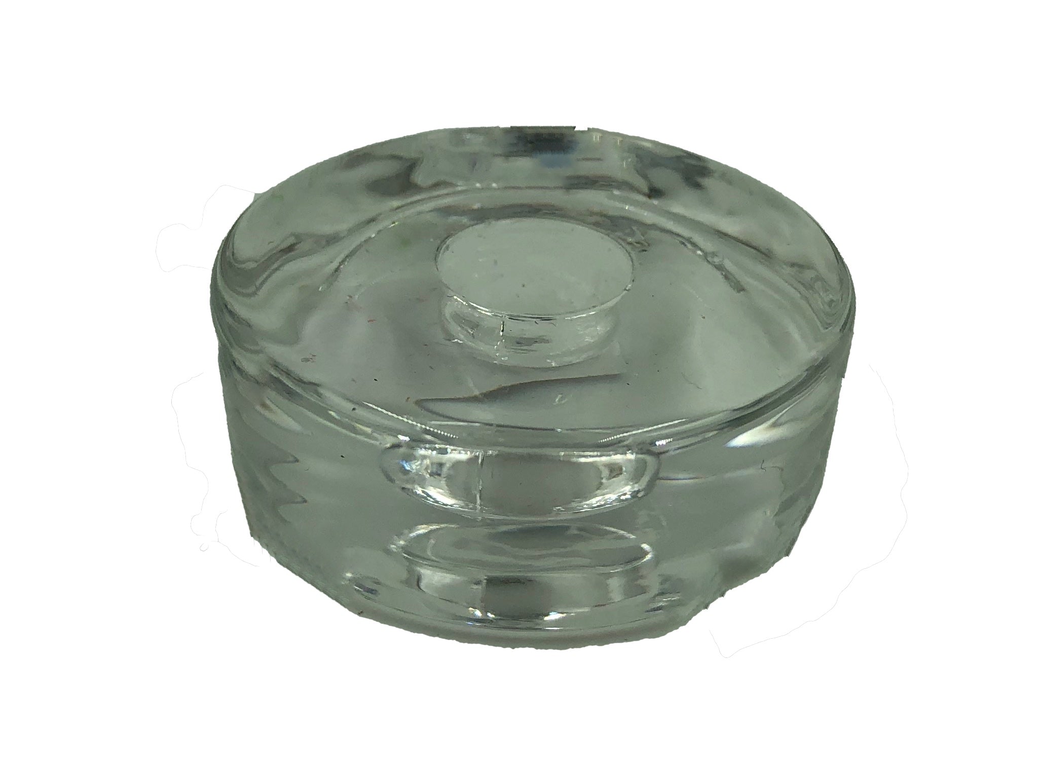 Round clear glass ritual candle holder about size of quarter