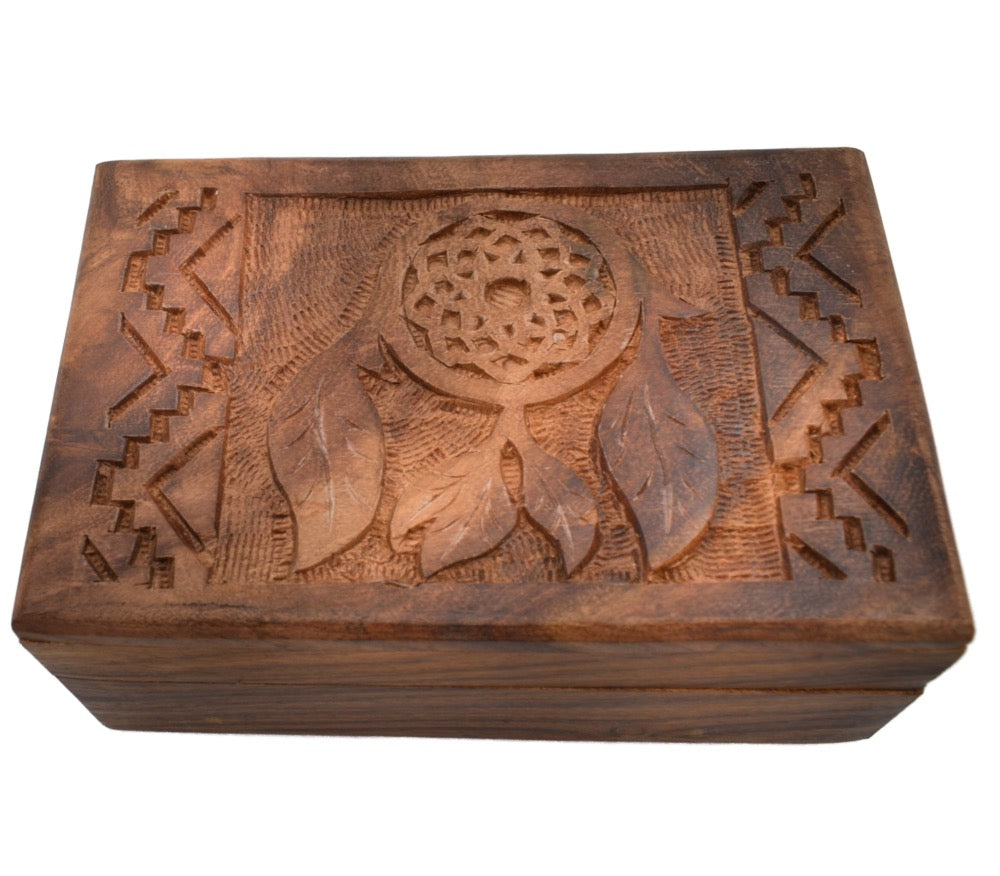 Dark wooden box, dream catcher carved into lid.