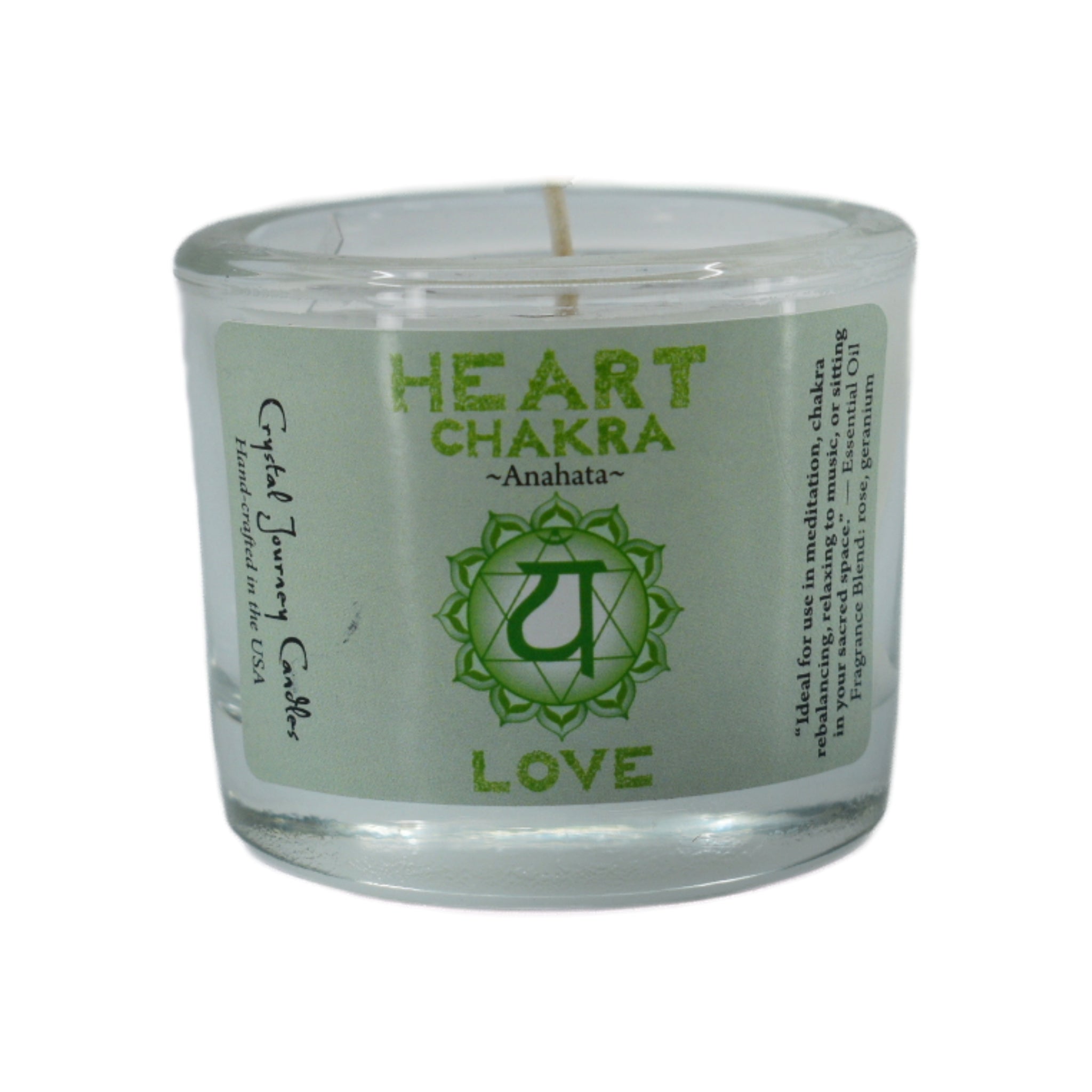 Heart Chakra Glass Votive Soy Candle.  The Heart Chakra includes the center of the chest.  It is associated with the heart, blood, upper back, lower lungs, breasts, circulation and skin.  The candle is white and scented with rose and geranium essentiol oils.  