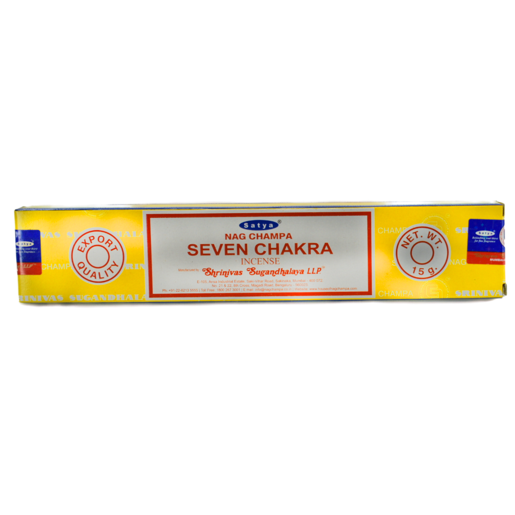Seven Chakra 15 gram Incense Sticks.  The box is yellow with white lines running through it.  The white lines have company words on them.  The center has a white rectangle with a red frame within the border.  the top half of the rectangle has the company name and the title listed; Satya, Nag Champa, Seven Chakra Incense.  On both sides of the rectangle is a circle.  The left circle says Export Quality and the right circle says Net. Weight 15 grams.  