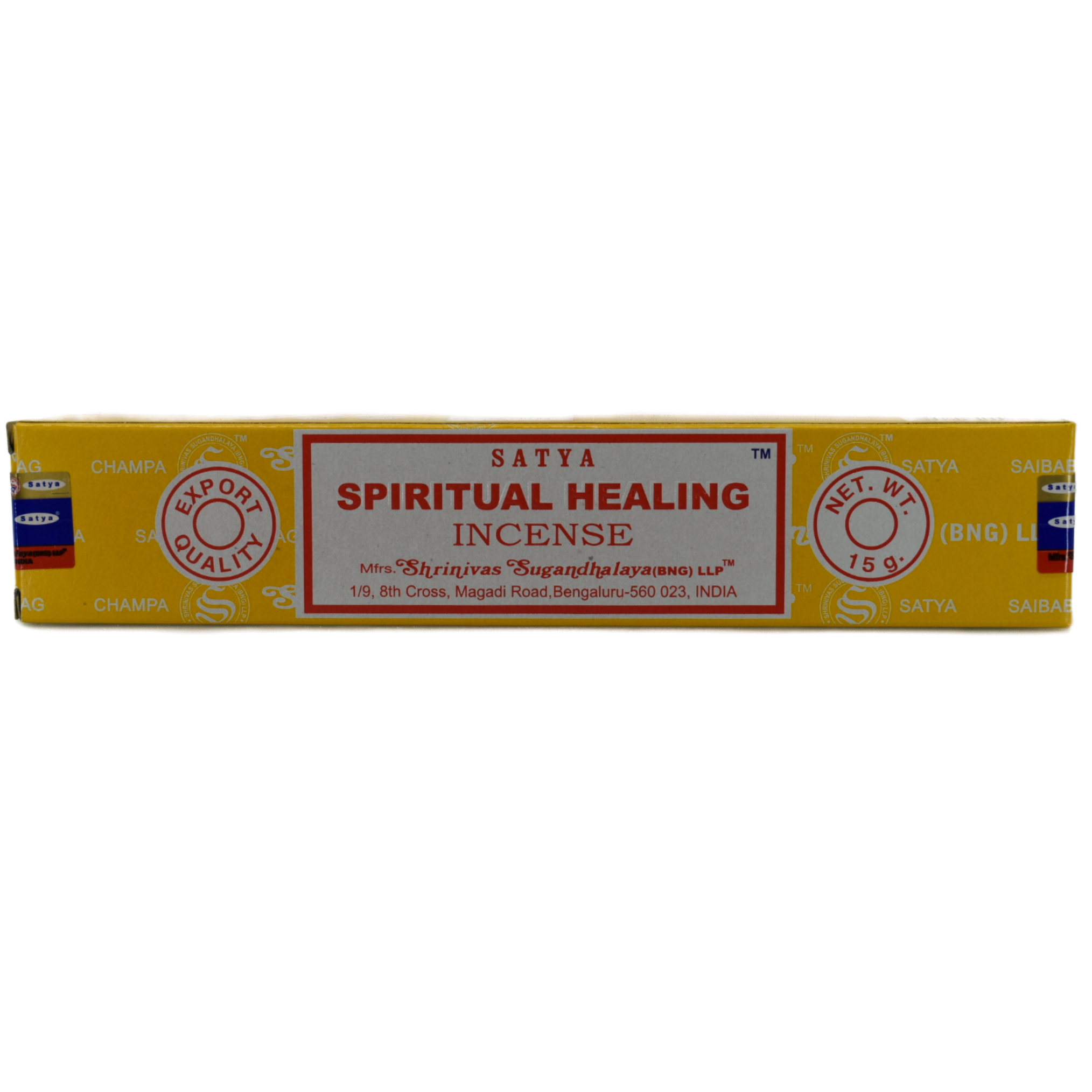 Spiritual Healing 15gr Incense Sticks.  The box is yellow with the design pattern of lines through it.  The lines have company keywords listed in white.  In the center is a rectangular box in white with a red border.  Top row has brand name Satya.  Below it is the title Spiritual Healing Incense.  At the bottom is the manufacturer's information listed.  On each side of the rectangle are a circle.  The left circle says Export Quality.  The right circle says Net. Weight 15 grams.