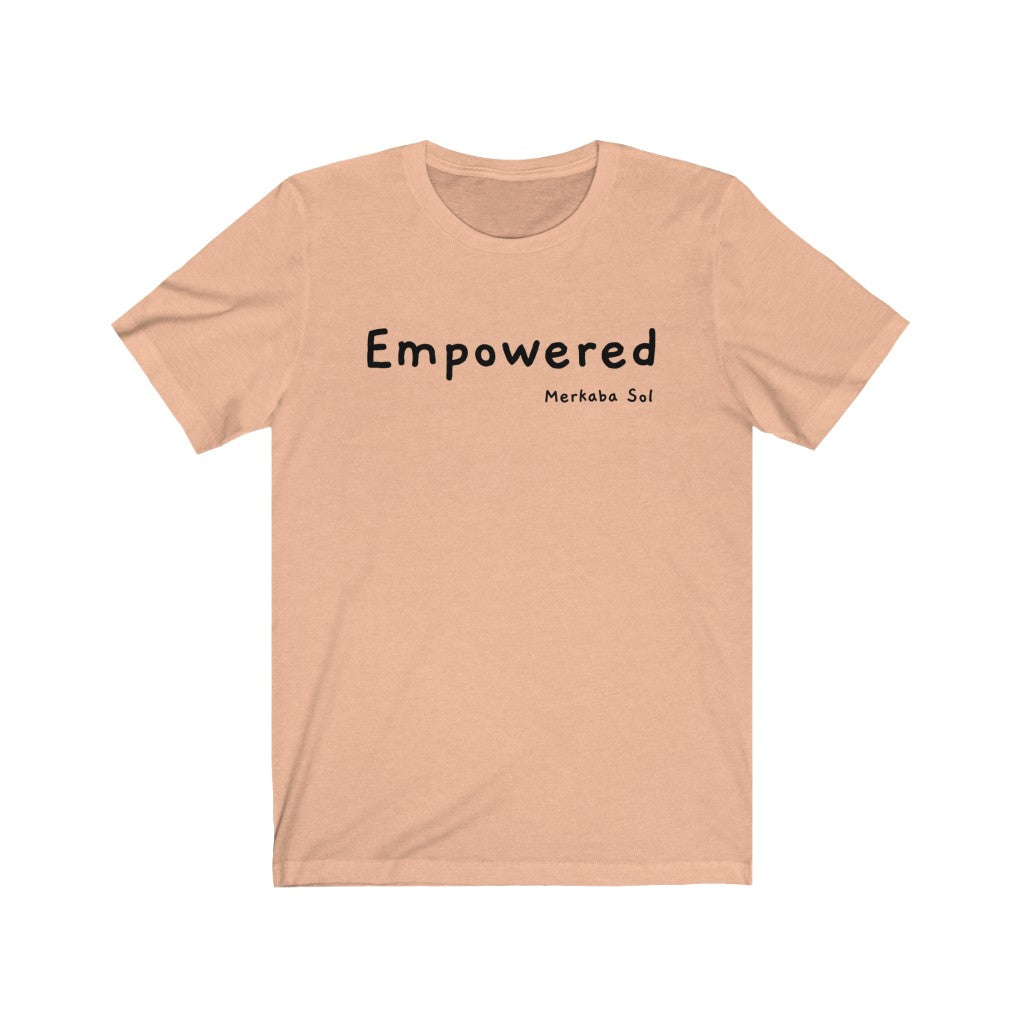 Empowered. Bring inspiration and empowerment to your wardrobe with this Empowered t-shirt in peach color or give it as a fun gift. From merkabasolshop.com