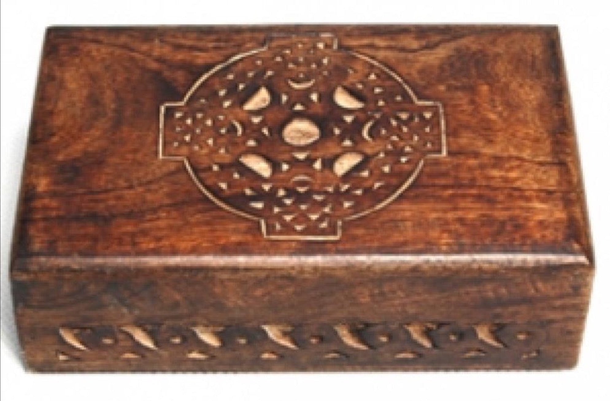 dark brown box with engraved Celtic Cross in center, scrolling on sides 
