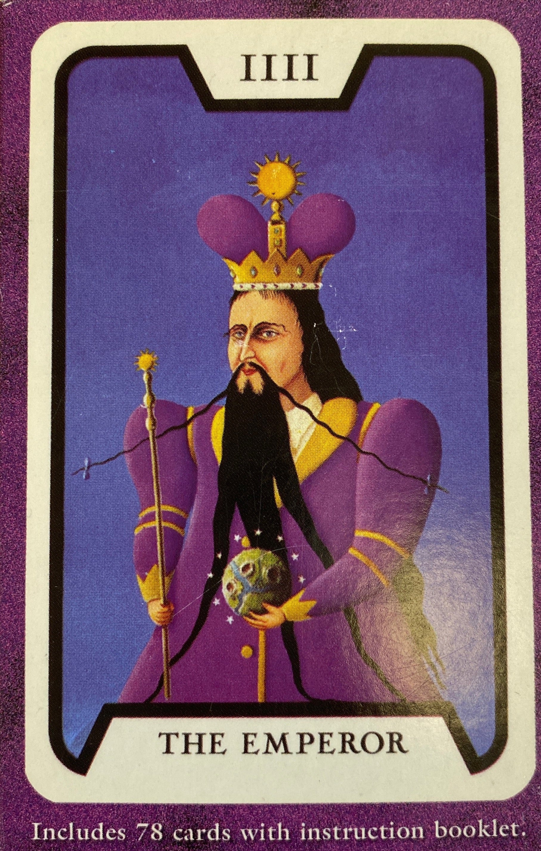 Back of box is purple with an image of king in robes 